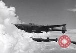 Image of P-38 of 13th Army Air Force jettisons auxiliary fuel tanks Pacific Theater, 1943, second 15 stock footage video 65675030627