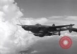 Image of P-38 of 13th Army Air Force jettisons auxiliary fuel tanks Pacific Theater, 1943, second 18 stock footage video 65675030627