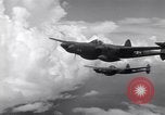 Image of P-38 of 13th Army Air Force jettisons auxiliary fuel tanks Pacific Theater, 1943, second 20 stock footage video 65675030627