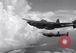 Image of P-38 of 13th Army Air Force jettisons auxiliary fuel tanks Pacific Theater, 1943, second 21 stock footage video 65675030627