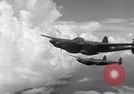 Image of P-38 of 13th Army Air Force jettisons auxiliary fuel tanks Pacific Theater, 1943, second 22 stock footage video 65675030627