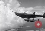 Image of P-38 of 13th Army Air Force jettisons auxiliary fuel tanks Pacific Theater, 1943, second 23 stock footage video 65675030627