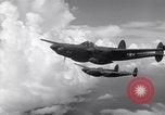 Image of P-38 of 13th Army Air Force jettisons auxiliary fuel tanks Pacific Theater, 1943, second 24 stock footage video 65675030627