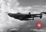Image of P-38 of 13th Army Air Force jettisons auxiliary fuel tanks Pacific Theater, 1943, second 27 stock footage video 65675030627