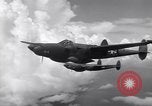 Image of P-38 of 13th Army Air Force jettisons auxiliary fuel tanks Pacific Theater, 1943, second 28 stock footage video 65675030627