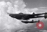 Image of P-38 of 13th Army Air Force jettisons auxiliary fuel tanks Pacific Theater, 1943, second 29 stock footage video 65675030627