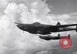 Image of P-38 of 13th Army Air Force jettisons auxiliary fuel tanks Pacific Theater, 1943, second 30 stock footage video 65675030627