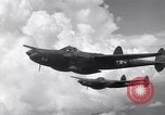Image of P-38 of 13th Army Air Force jettisons auxiliary fuel tanks Pacific Theater, 1943, second 32 stock footage video 65675030627