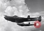 Image of P-38 of 13th Army Air Force jettisons auxiliary fuel tanks Pacific Theater, 1943, second 33 stock footage video 65675030627