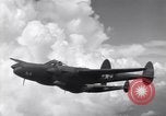 Image of P-38 of 13th Army Air Force jettisons auxiliary fuel tanks Pacific Theater, 1943, second 34 stock footage video 65675030627