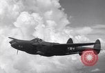 Image of P-38 of 13th Army Air Force jettisons auxiliary fuel tanks Pacific Theater, 1943, second 35 stock footage video 65675030627