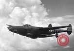 Image of P-38 of 13th Army Air Force jettisons auxiliary fuel tanks Pacific Theater, 1943, second 36 stock footage video 65675030627