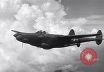 Image of P-38 of 13th Army Air Force jettisons auxiliary fuel tanks Pacific Theater, 1943, second 38 stock footage video 65675030627