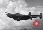 Image of P-38 of 13th Army Air Force jettisons auxiliary fuel tanks Pacific Theater, 1943, second 39 stock footage video 65675030627