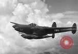 Image of P-38 of 13th Army Air Force jettisons auxiliary fuel tanks Pacific Theater, 1943, second 40 stock footage video 65675030627