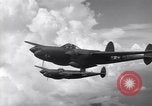 Image of P-38 of 13th Army Air Force jettisons auxiliary fuel tanks Pacific Theater, 1943, second 41 stock footage video 65675030627
