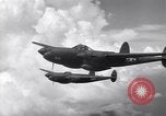 Image of P-38 of 13th Army Air Force jettisons auxiliary fuel tanks Pacific Theater, 1943, second 42 stock footage video 65675030627