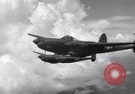 Image of P-38 of 13th Army Air Force jettisons auxiliary fuel tanks Pacific Theater, 1943, second 43 stock footage video 65675030627