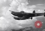 Image of P-38 of 13th Army Air Force jettisons auxiliary fuel tanks Pacific Theater, 1943, second 44 stock footage video 65675030627