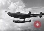 Image of P-38 of 13th Army Air Force jettisons auxiliary fuel tanks Pacific Theater, 1943, second 46 stock footage video 65675030627
