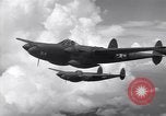 Image of P-38 of 13th Army Air Force jettisons auxiliary fuel tanks Pacific Theater, 1943, second 49 stock footage video 65675030627