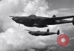 Image of P-38 of 13th Army Air Force jettisons auxiliary fuel tanks Pacific Theater, 1943, second 50 stock footage video 65675030627