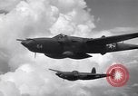 Image of P-38 of 13th Army Air Force jettisons auxiliary fuel tanks Pacific Theater, 1943, second 51 stock footage video 65675030627