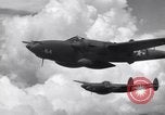 Image of P-38 of 13th Army Air Force jettisons auxiliary fuel tanks Pacific Theater, 1943, second 53 stock footage video 65675030627