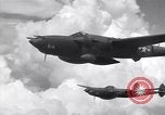 Image of P-38 of 13th Army Air Force jettisons auxiliary fuel tanks Pacific Theater, 1943, second 54 stock footage video 65675030627