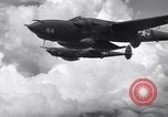 Image of P-38 of 13th Army Air Force jettisons auxiliary fuel tanks Pacific Theater, 1943, second 58 stock footage video 65675030627