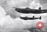 Image of P-38 of 13th Army Air Force jettisons auxiliary fuel tanks Pacific Theater, 1943, second 62 stock footage video 65675030627
