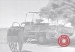 Image of Burning British vehicle North Africa, 1943, second 1 stock footage video 65675030883
