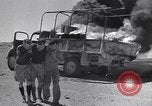 Image of Burning British vehicle North Africa, 1943, second 4 stock footage video 65675030883