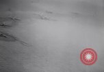 Immagine di Aviosuperficie di giapponese e piani a Lae distrutta dai bombardieri alleati Nuova Guinea, 1943, secondo 12 filmato di repertorio 65675030887