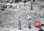 Immagine di Aviosuperficie di giapponese e piani a Lae distrutta dai bombardieri alleati Nuova Guinea, 1943, secondo 18 filmato di repertorio 65675030887