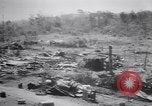 Immagine di Aviosuperficie di giapponese e piani a Lae distrutta dai bombardieri alleati Nuova Guinea, 1943, secondo 25 filmato di repertorio 65675030887