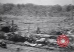 Immagine di Aviosuperficie di giapponese e piani a Lae distrutta dai bombardieri alleati Nuova Guinea, 1943, secondo 27 filmato di repertorio 65675030887