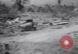Immagine di Aviosuperficie di giapponese e piani a Lae distrutta dai bombardieri alleati Nuova Guinea, 1943, secondo 48 filmato di repertorio 65675030887