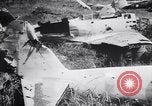 Immagine di Aviosuperficie di giapponese e piani a Lae distrutta dai bombardieri alleati Nuova Guinea, 1943, secondo 56 filmato di repertorio 65675030887