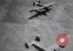 Image of U.S. B-24 heavy bombers in low level raid on oil fields and refineries Ploesti Romania, 1943, second 6 stock footage video 65675030893