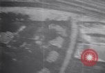 Image of U.S. B-24 heavy bombers in low level raid on oil fields and refineries Ploesti Romania, 1943, second 53 stock footage video 65675030893