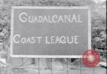 Image of US soldiers baseball match Guadalcanal Solomon Islands, 1943, second 15 stock footage video 65675030932