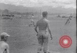 Image of US soldiers baseball match Guadalcanal Solomon Islands, 1943, second 26 stock footage video 65675030932