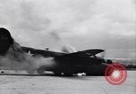 Image of C-87 in flames China, 1943, second 10 stock footage video 65675030937