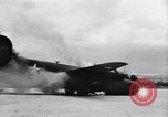 Image of C-87 in flames China, 1943, second 11 stock footage video 65675030937