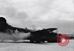 Image of C-87 in flames China, 1943, second 12 stock footage video 65675030937