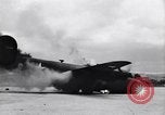 Image of C-87 in flames China, 1943, second 13 stock footage video 65675030937