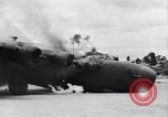 Image of C-87 in flames China, 1943, second 16 stock footage video 65675030937