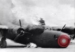 Image of C-87 in flames China, 1943, second 20 stock footage video 65675030937