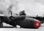 Image of C-87 in flames China, 1943, second 21 stock footage video 65675030937